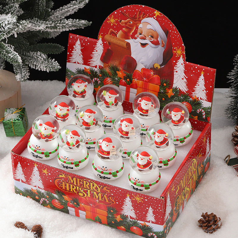 Leuchtende Weihnachts-Schneekugel mit Figuren