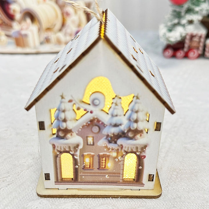 Beleuchtetes Weihnachts-Holzhaus im skandinavischen Stil