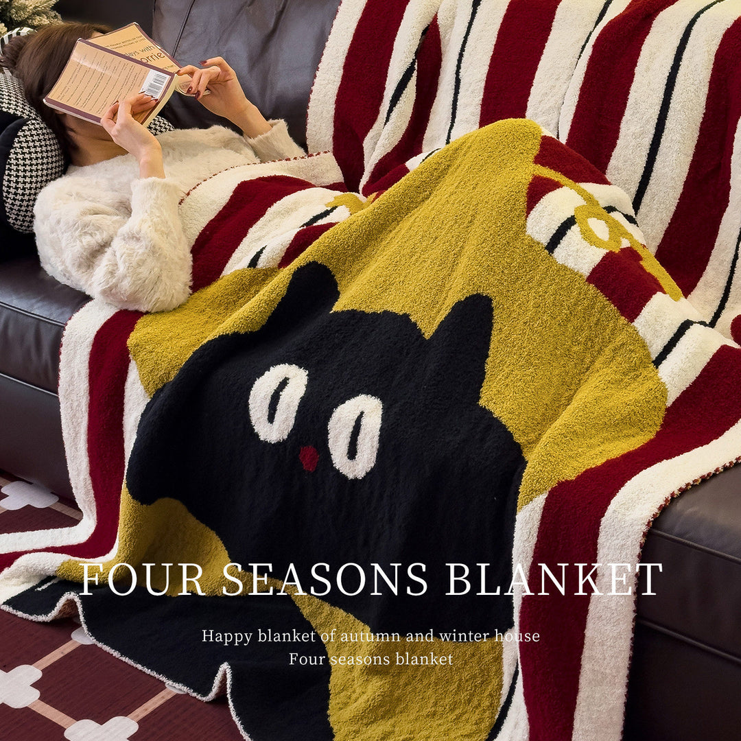 Flauschige Wolldecke mit Cartoon-Motiven