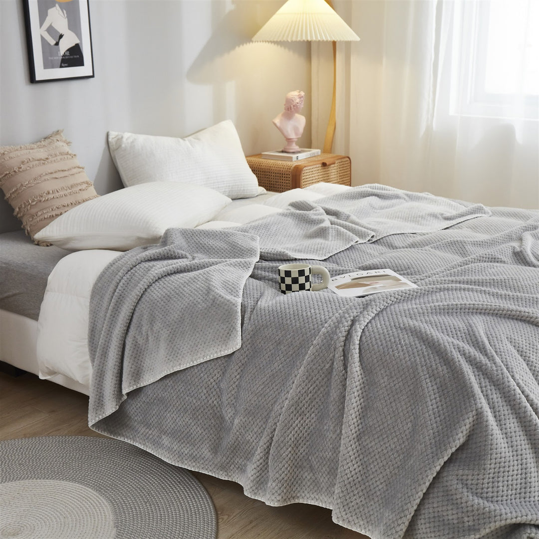 Flauschige Flanell-Decke mit Waffelstruktur