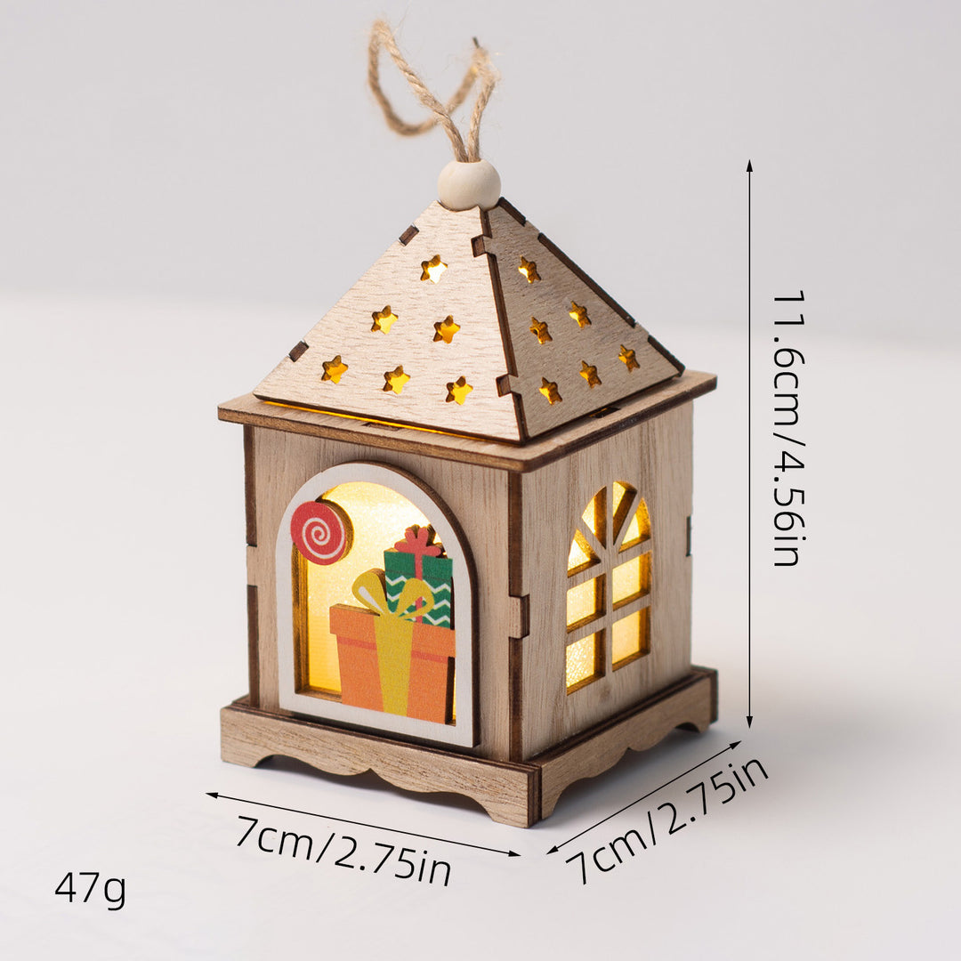 Beleuchtetes Holzhaus als Weihnachtsdekoration