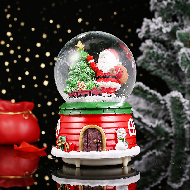 Weihnachtliche Schneekugel mit Musik und Licht