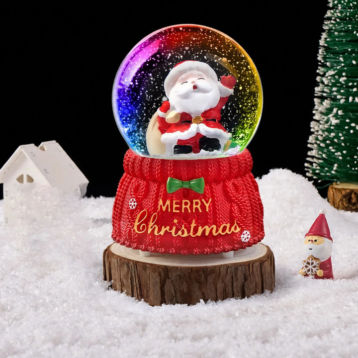 Weihnachtliche Schneekugel mit Licht und Musik
