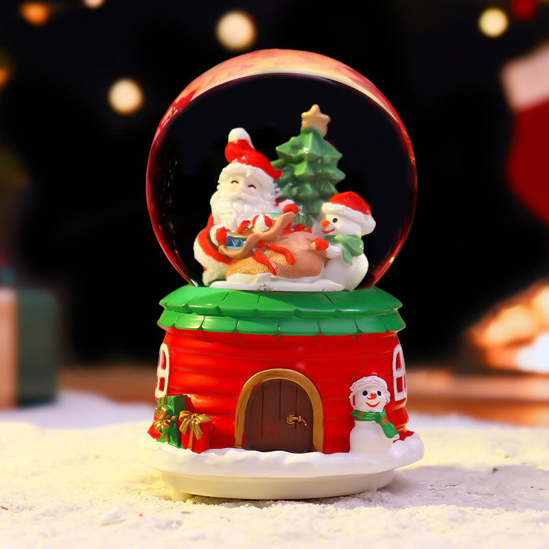 Weihnachtliche Schneekugel mit Musik und Licht