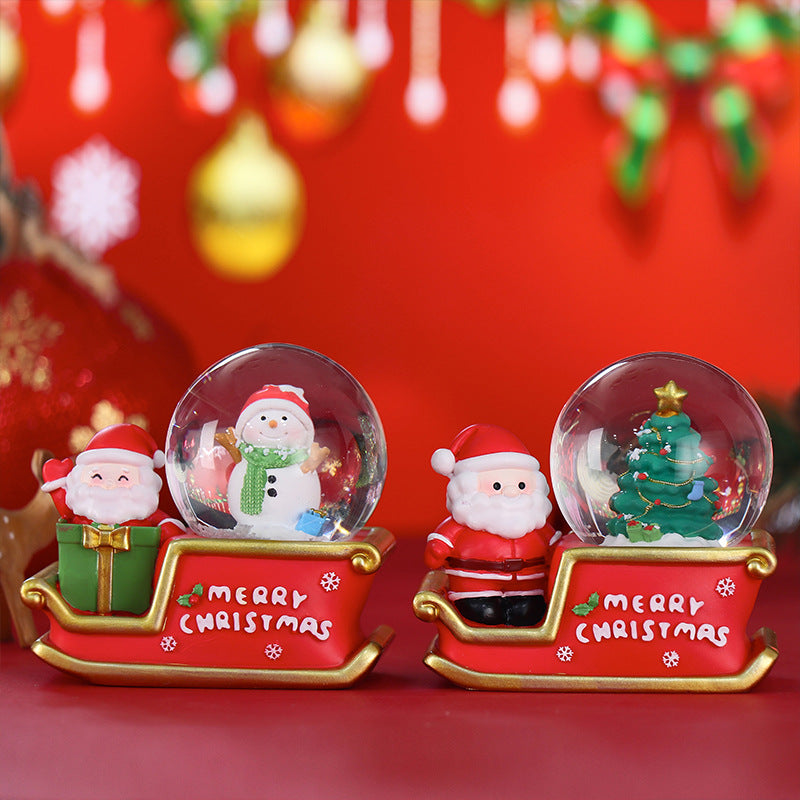Weihnachtliche Schneekugel mit Beleuchtung und Glitzereffekt