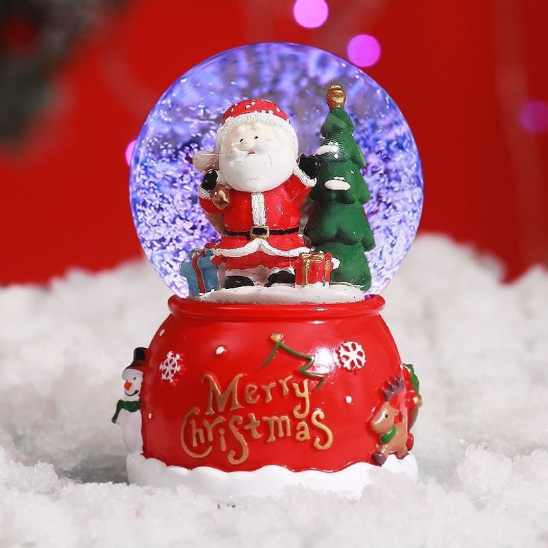 Weihnachtliche Schneekugel mit Musik und Licht