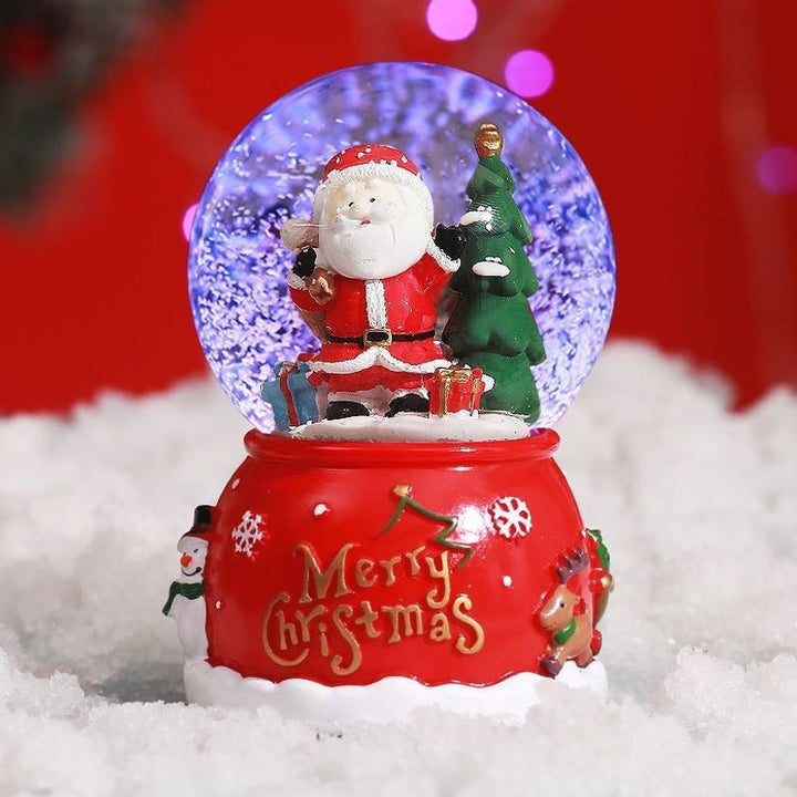 Weihnachtliche Schneekugel mit Musik und Licht