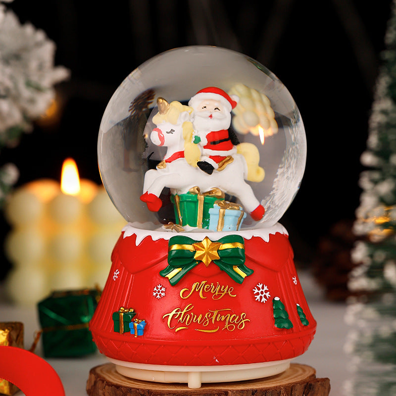 Weihnachtliche Schneekugel mit Musik und Licht