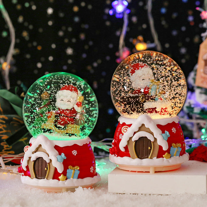 Weihnachts-Schneekugel mit Weihnachtsmann auf Motorrad