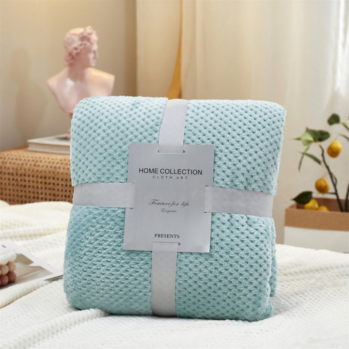 Flauschige Flanell-Decke mit Waffelstruktur