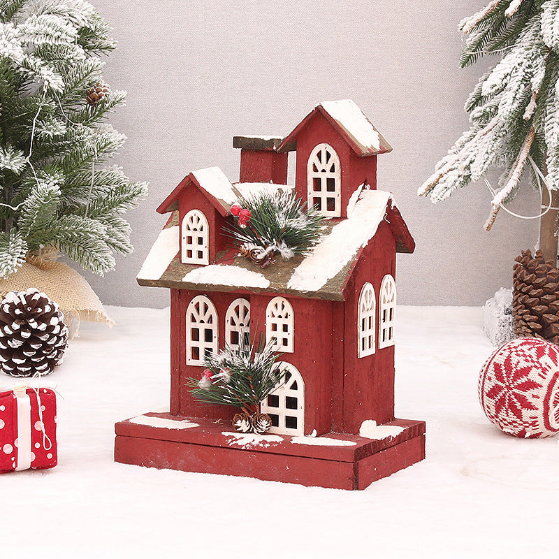 Beleuchtetes rotes Holzhaus, Weihnachtsdekoration