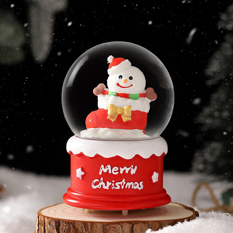 Dekorative Weihnachtskugel mit Licht und Schneeeffekt