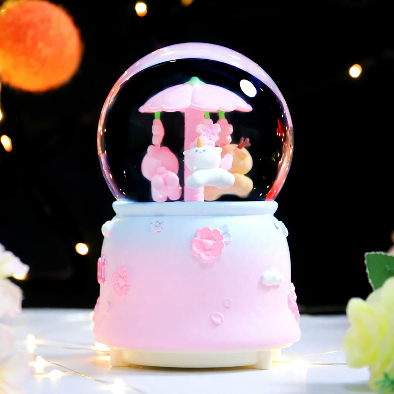 Spieluhr-Schneekugel mit Licht und Musik