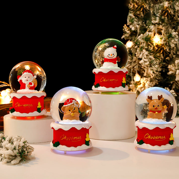 Leuchtende Schneekugel mit weihnachtlichen Motiven