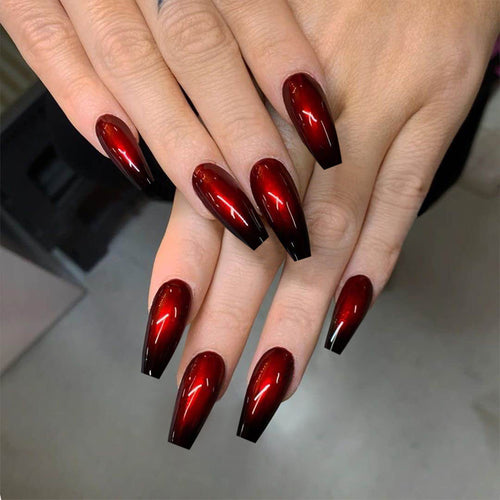 Künstliche Nagelkunst im eleganten Stiletto-Design mit glänzenden Farbverlauf Karnz