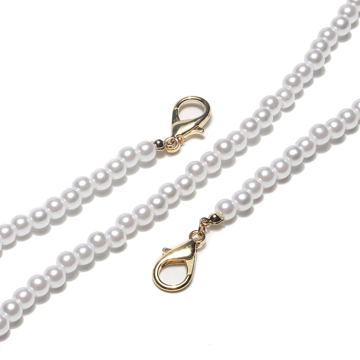 Elegante mit Perlenakzenten versehene Brillenhalterung Karnz