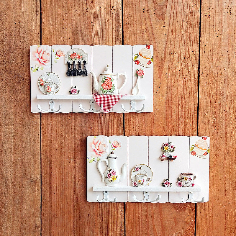 Dekorativer floral Wandhakenregal