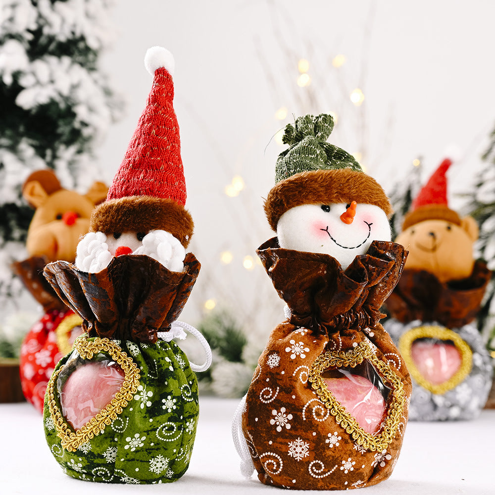 Niedliche Weihnachtsfigur mit Herzbeutel Karnz