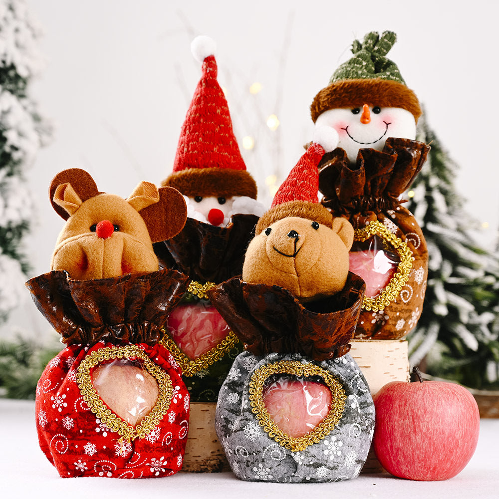 Niedliche Weihnachtsfigur mit Herzbeutel Karnz