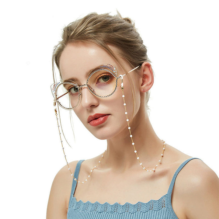 Elegante Brillenhalterkette mit Perlen und Edelstahl-Details Karnz
