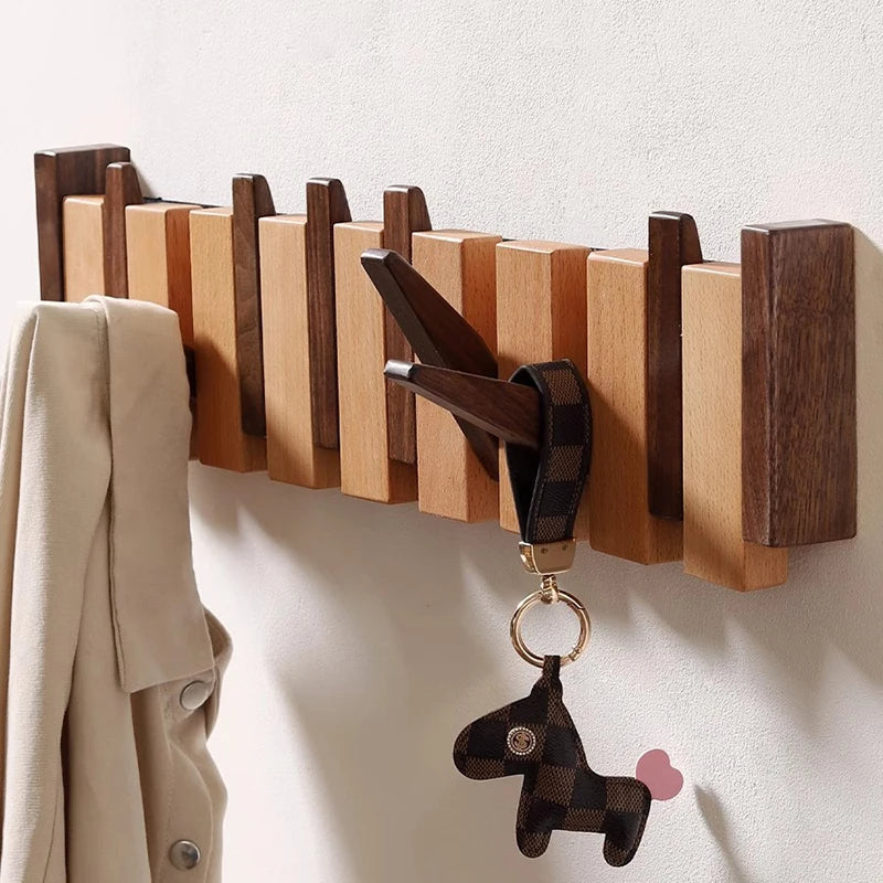 Holzgarderobe im Piano-Design mit klappbaren Haken | Karnz