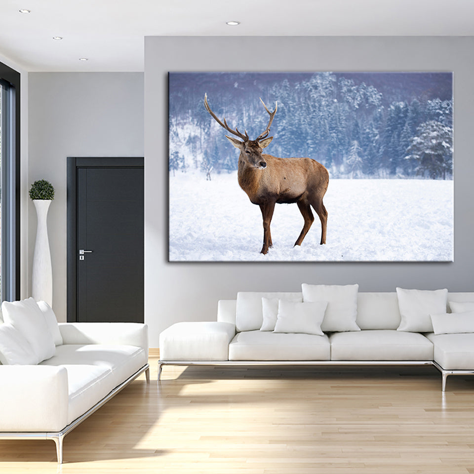 Hirsche in verschneiter Landschaft - Leinwandbild