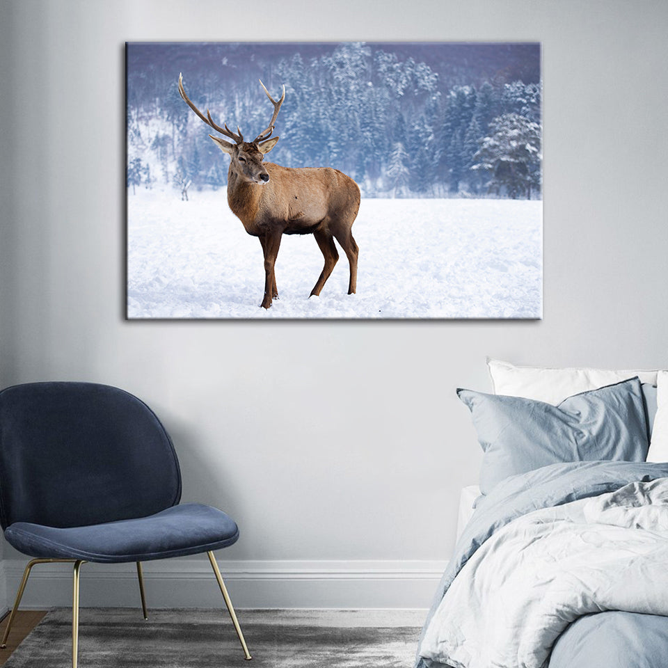 Hirsche in verschneiter Landschaft - Leinwandbild