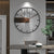 Robuste Wanduhr aus Stahl und Walnuss - Stilvolles Design für jedes Interieur | Karnz