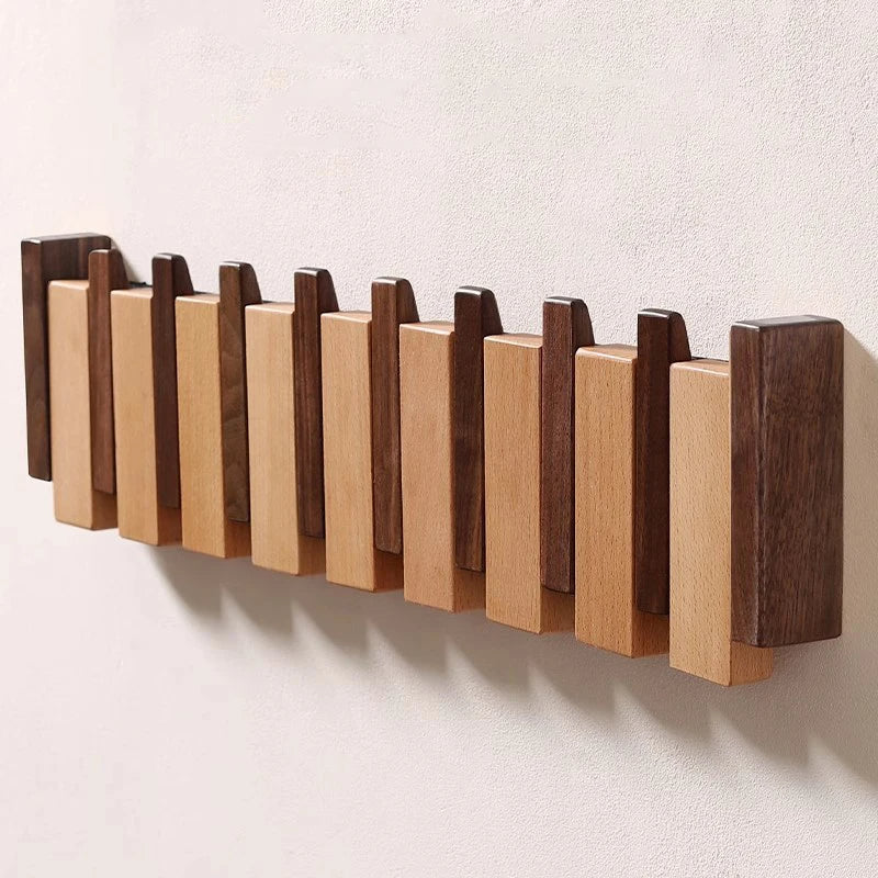 Holzgarderobe im Piano-Design mit klappbaren Haken | Karnz
