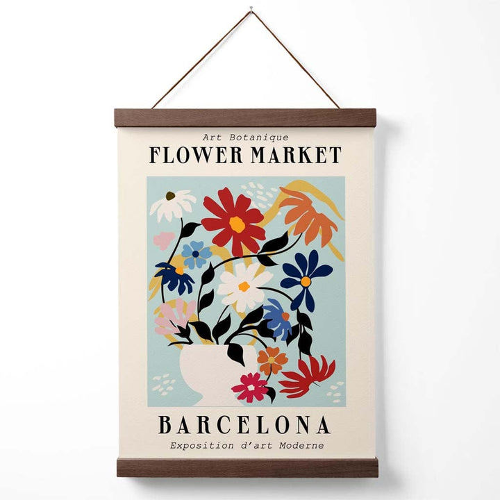 Ausstellungsplakat zum blau-rosa Blumenmarkt in Barcelona mit Aufhänger