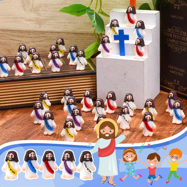 Mini-Jesusfiguren mit dem Slogan „Jesus liebt dich“