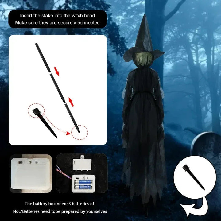 Leuchtende Hand hält Halloween-Hexen-Dekoration