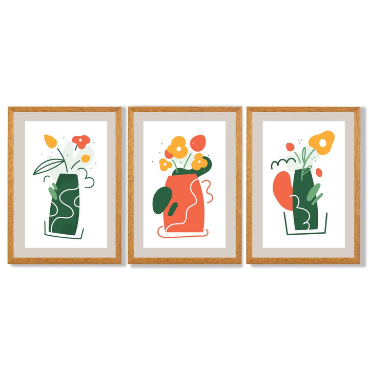 Boho-minimalistischer Kunstdruck mit Blumenmuster in Grün und Orange, 3er-Set gerahmte Kunstdrucke
