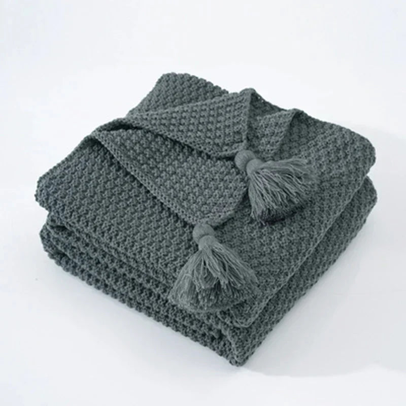 Gemütliche gestrickte Wolldecke mit elegantem Fransen