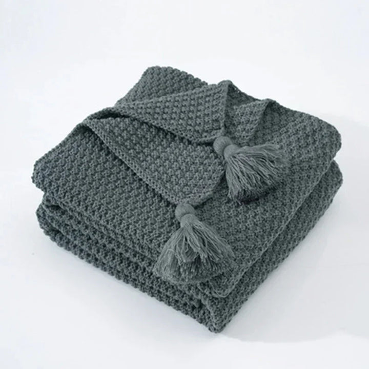 Gemütliche gestrickte Wolldecke mit elegantem Fransen