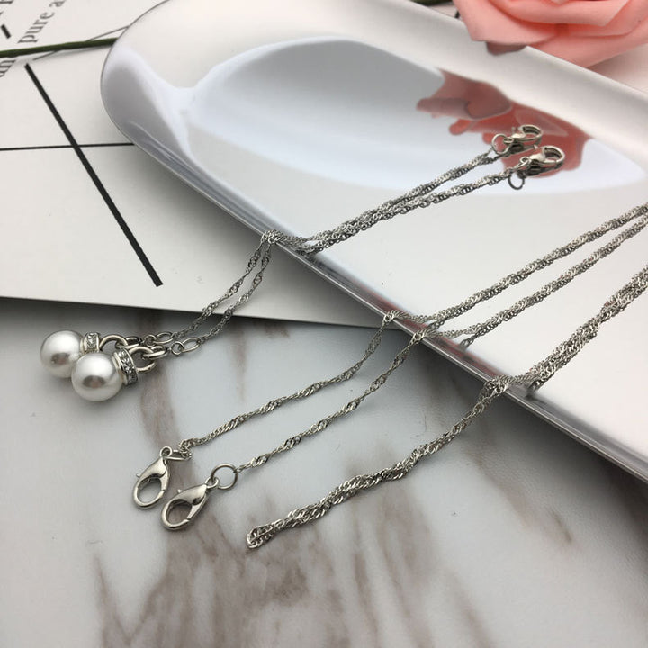 Elegante Halskette mit Perlenanhängern Karnz