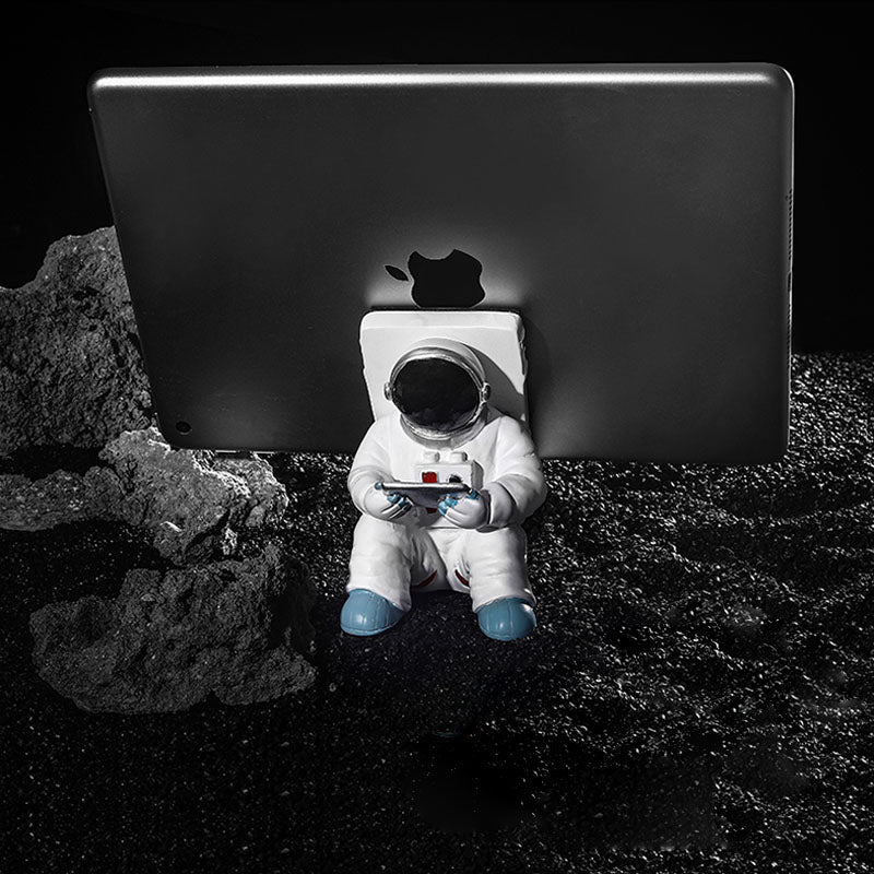 Unterstützung für Mobiltelefon oder Stift in Astronautendekorationen | Karnz