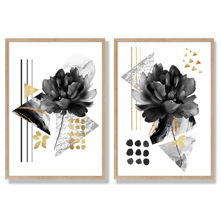 Moderne Blumenmotive, schwarz-gold gerahmtes Set aus 2 Kunstdrucken