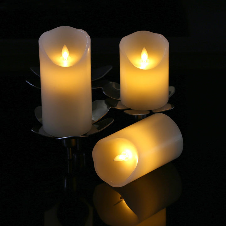 Realistische flammenlose LED-Säulenkerzen-Kollektion mit flackerndem warmen Glanz und tropfender Wachskante Karnz