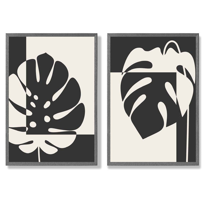 Set aus 2 gerahmten Kunstdrucken mit Monstera-Motiven in Schwarz und Beige