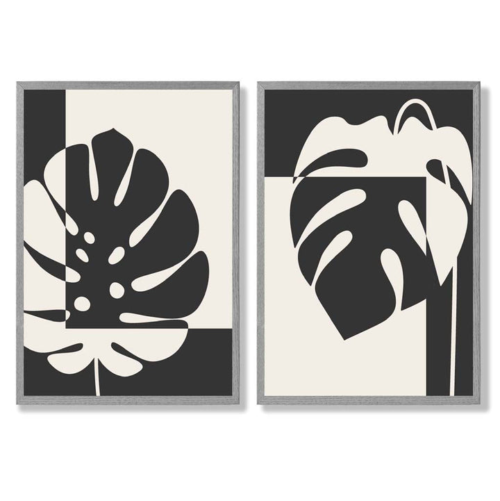Set aus 2 gerahmten Kunstdrucken mit Monstera-Motiven in Schwarz und Beige