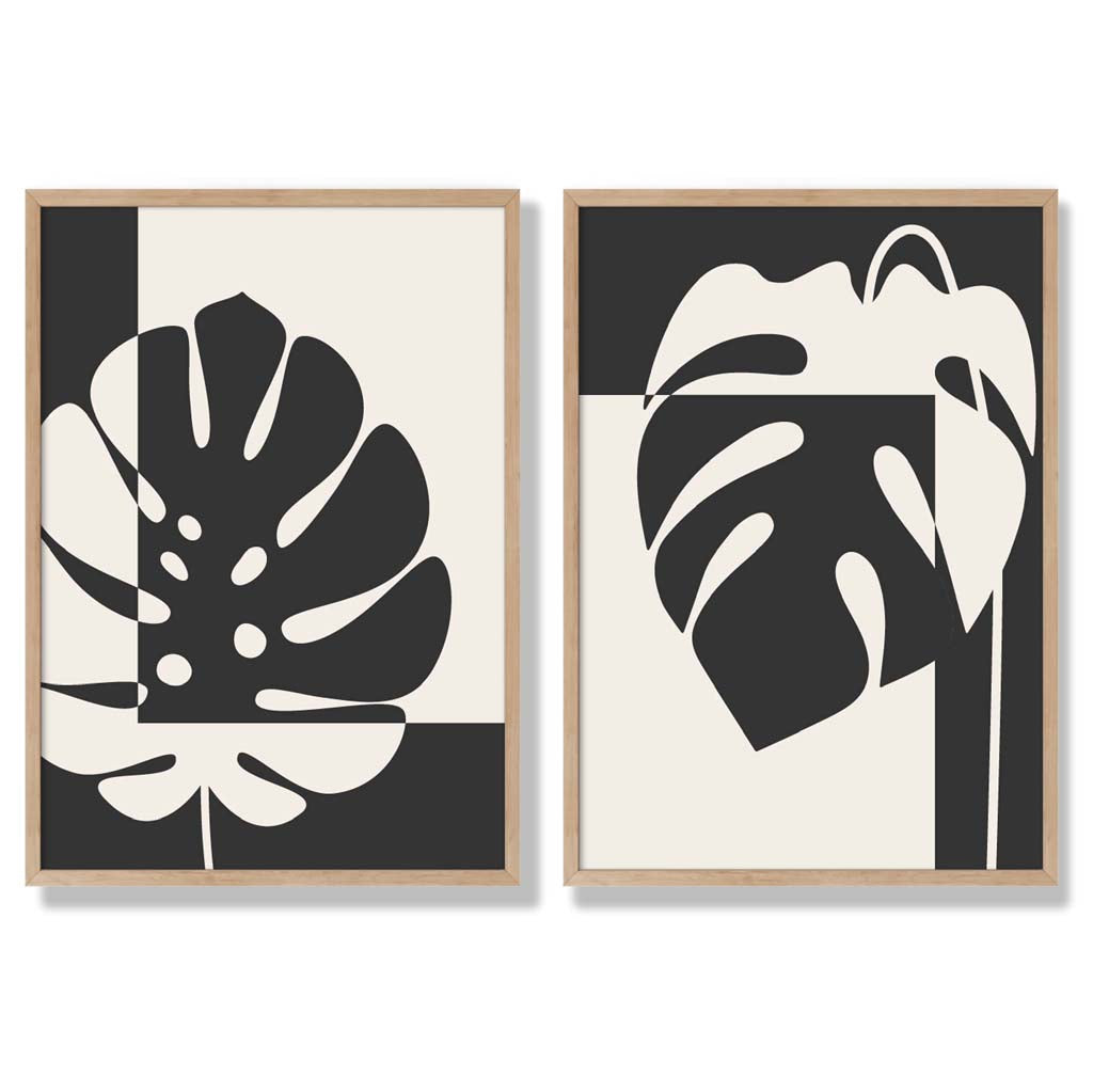 Set aus 2 gerahmten Kunstdrucken mit Monstera-Motiven in Schwarz und Beige