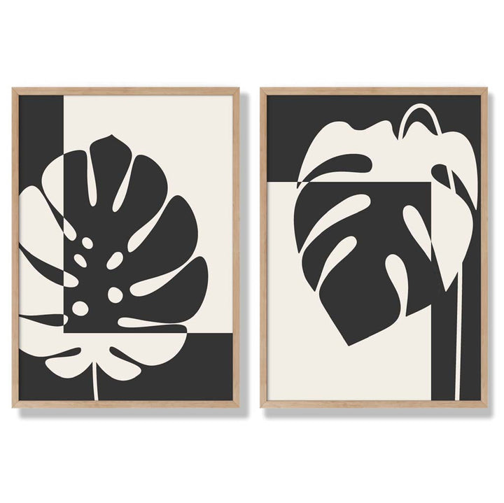 Set aus 2 gerahmten Kunstdrucken mit Monstera-Motiven in Schwarz und Beige