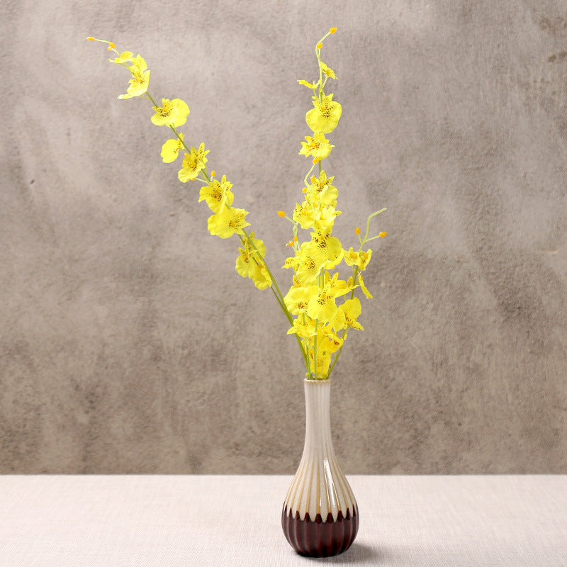 Elegante Blumenarrangement Vase Karnz
