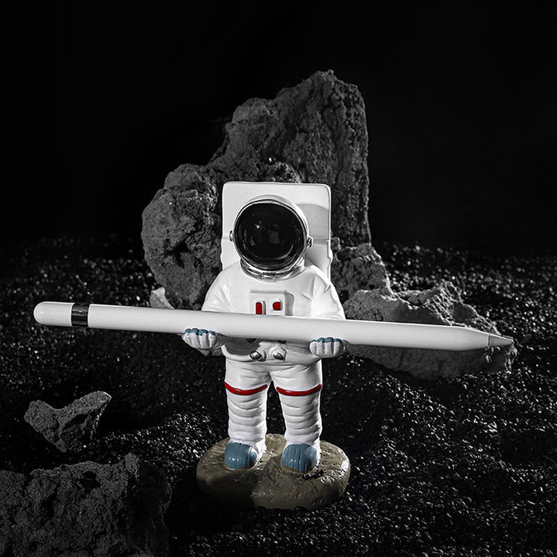 Unterstützung für Mobiltelefon oder Stift in Astronautendekorationen | Karnz