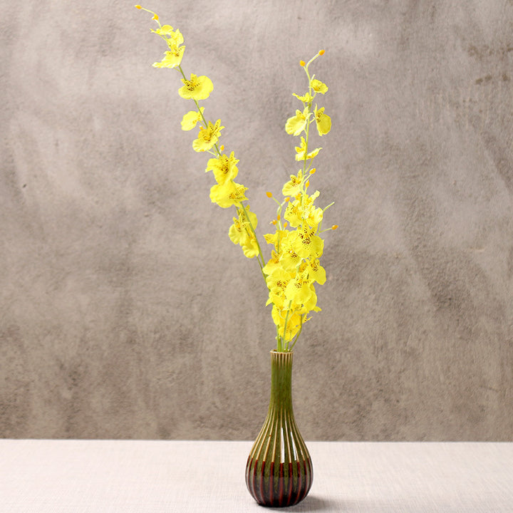 Elegante Blumenarrangement Vase Karnz