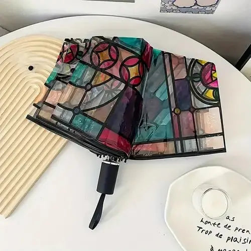 Automatischer Regenschirm – Vintage-Design mit Buntglas und Windvorhersage