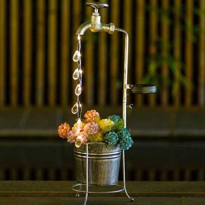 Moderne Art Deco Solar Wasserhahn Wasser Tropfen Fließendes Wasser Pflanzenform Eisen LED Außenlicht Für Garten | Karnz