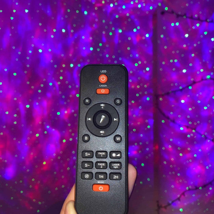 Tragbarer Galaxy-Projektor mit Bluetooth-Lautsprecher und Fernbedienung