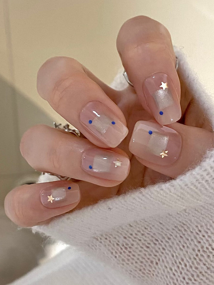Elegantes Press-On-Nageldesign-Set mit Stern- und Punktmustern Karnz